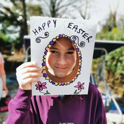 Portrait of a smiling woman with text