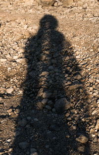 High angle view of shadow on sand