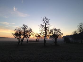 Scenic view of landscape at sunset