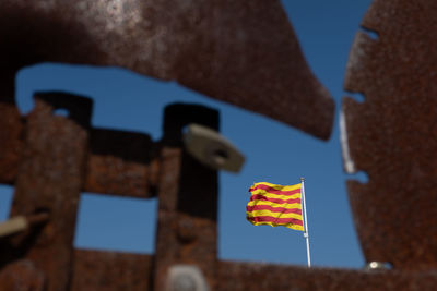 Close-up of flag against clear blue sky