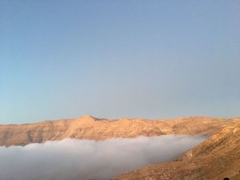 Scenic view of desert against clear sky