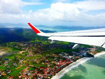 View of mountain range against cloudy sky
