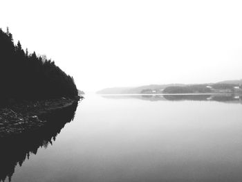 Scenic view of calm sea against clear sky