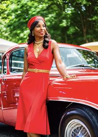 Portrait of young woman in car