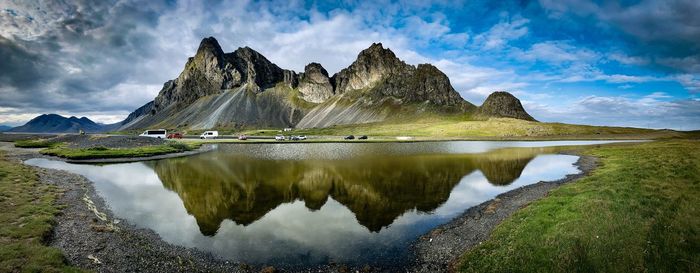 Panoramic view of lake and mountains against sky