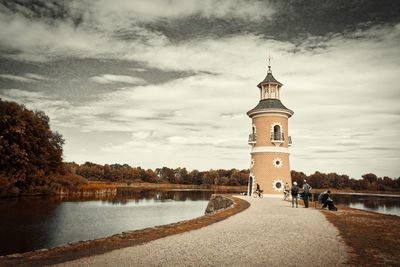 Tower amidst buildings against sky