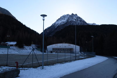 Snow covered mountain against clear sky