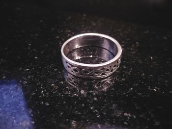High angle view of rings on table