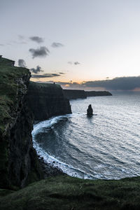 Scenic view of sea against sky during sunset