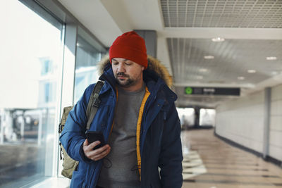 Man holding mobile phone