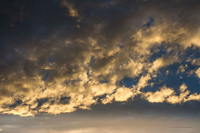 Low angle view of clouds in sky during sunset