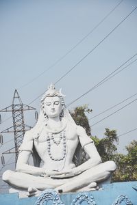 Low angle view of statue against clear sky