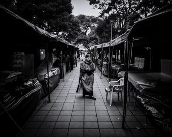 Full length of mature woman standing on street