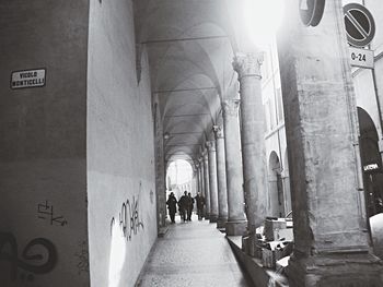 People walking in corridor