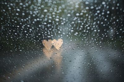 Close-up of water drops on window