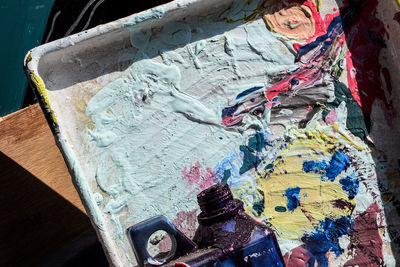 High angle view of graffiti on art palette