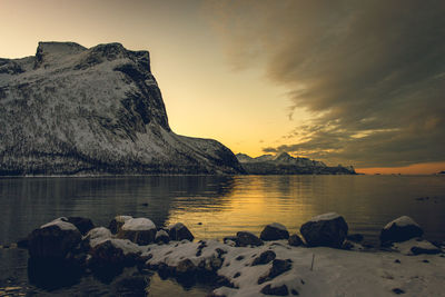 Scenic view of lake against sky during sunset