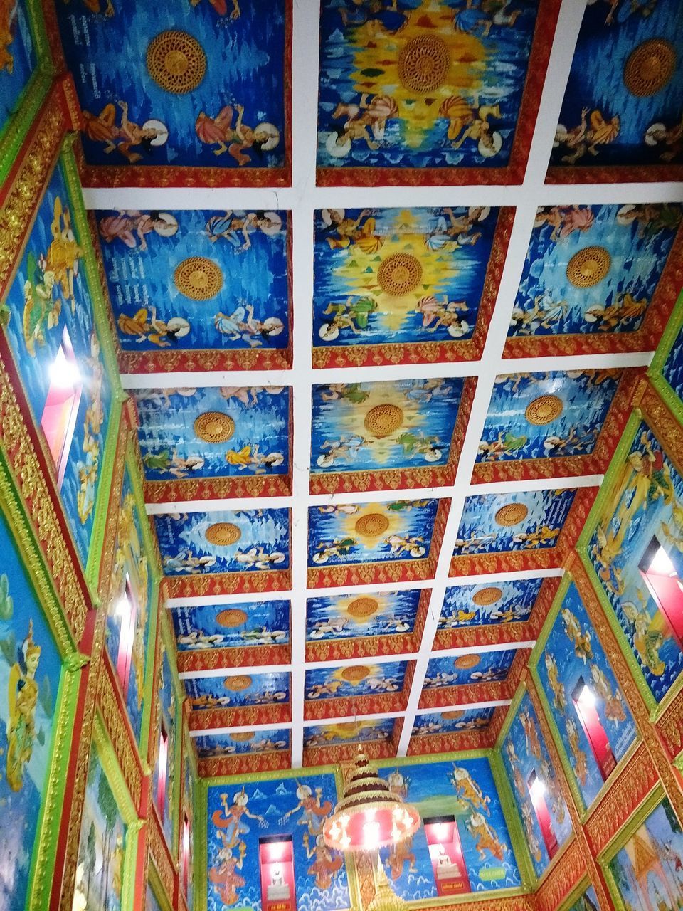 LOW ANGLE VIEW OF ILLUMINATED CEILING OF CATHEDRAL