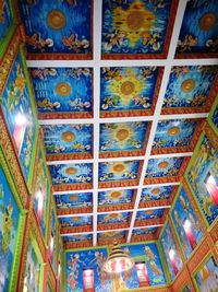 Low angle view of illuminated ceiling