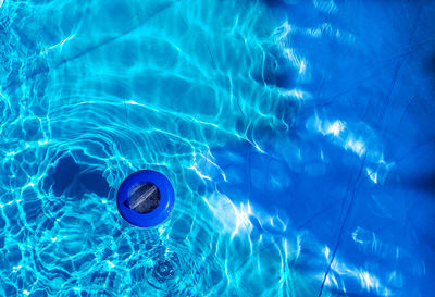 High angle view of cleaner in swimming pool