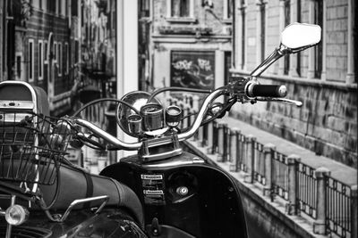 Close-up of bicycle parked on street