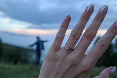 Close-up of woman wearing ring