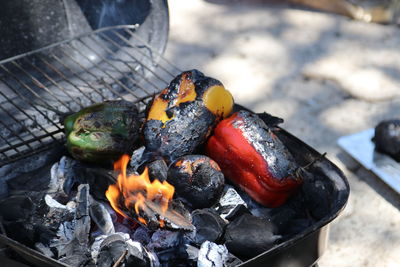 High angle view of meat on barbecue grill