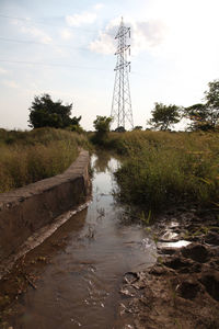 View of electricity pylon against sky