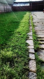 Footpath leading to narrow pathway