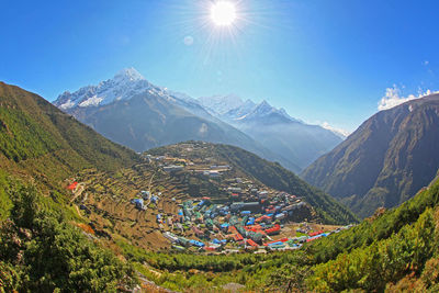 Scenic view of mountains against sky during winter