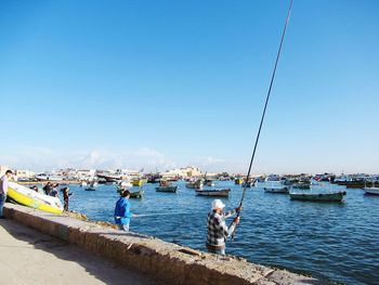 Scenic view of sea against clear blue sky