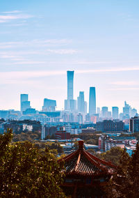 Modern buildings in city against sky