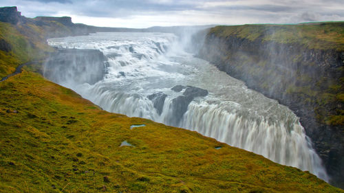 Scenic view of gullfoss against sky