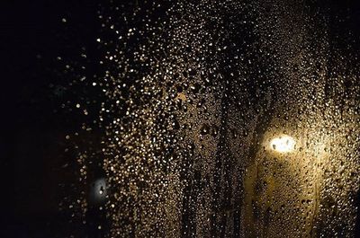 Close-up of water drops on glass