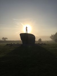 Man against sky during sunset