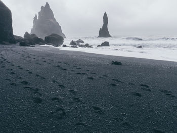 Scenic view of beach against sky