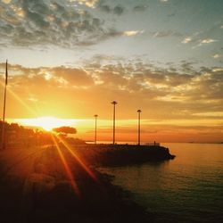 Scenic view of sea at sunset