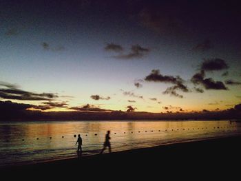 Scenic view of sea at sunset