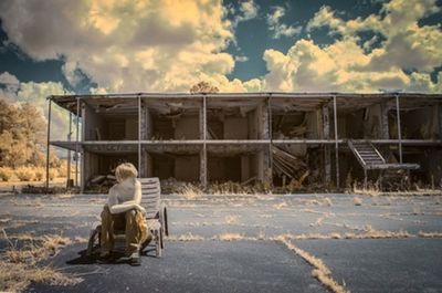 View of people against cloudy sky