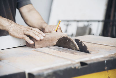 Man working on wood