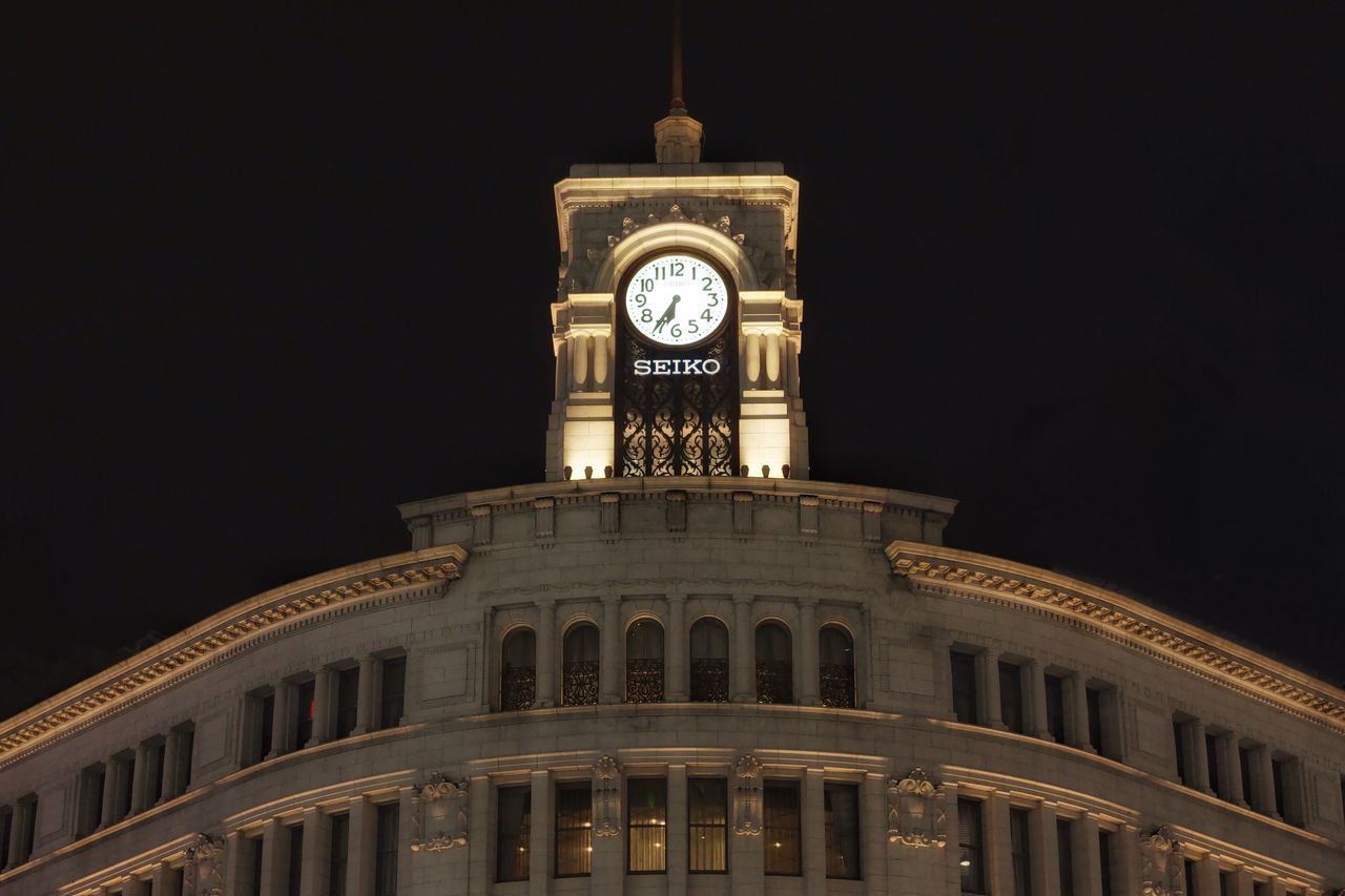 LOW ANGLE VIEW OF CLOCK TOWER IN CITY