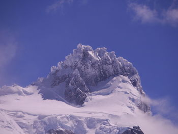 Low angle view of snowcapped mountain against sky. torres del paine mountains, chile 