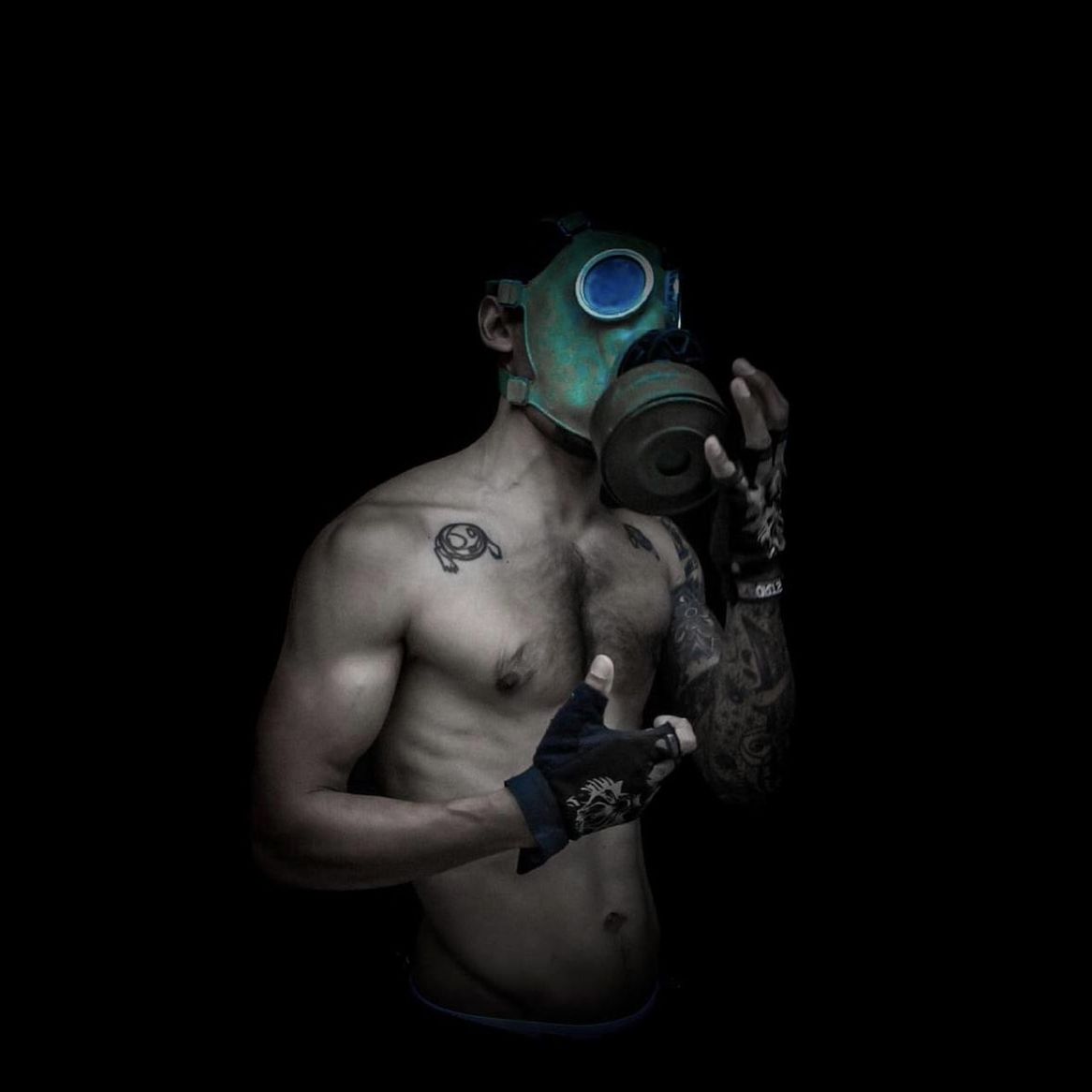 black background, studio shot, one person, indoors, adult, sports, men, cut out, strength, copy space, muscular build, portrait, gas mask, athlete