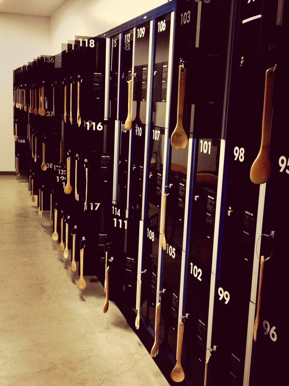 indoors, communication, technology, in a row, number, large group of objects, close-up, order, metal, connection, control, repetition, machinery, text, old-fashioned, still life, equipment, control panel, retro styled, music