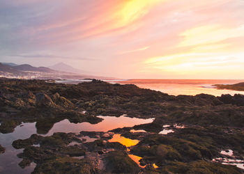 Scenic view of sea against sky during sunset