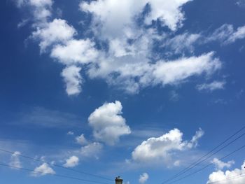 Low angle view of vapor trail in sky