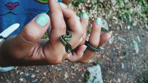  woman holding a snake