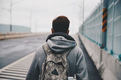 Rear view of man in bus