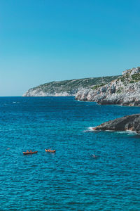 Scenic view of sea against clear sky