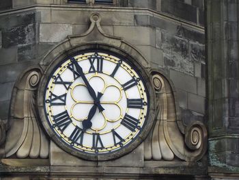 The clock tower on an old building